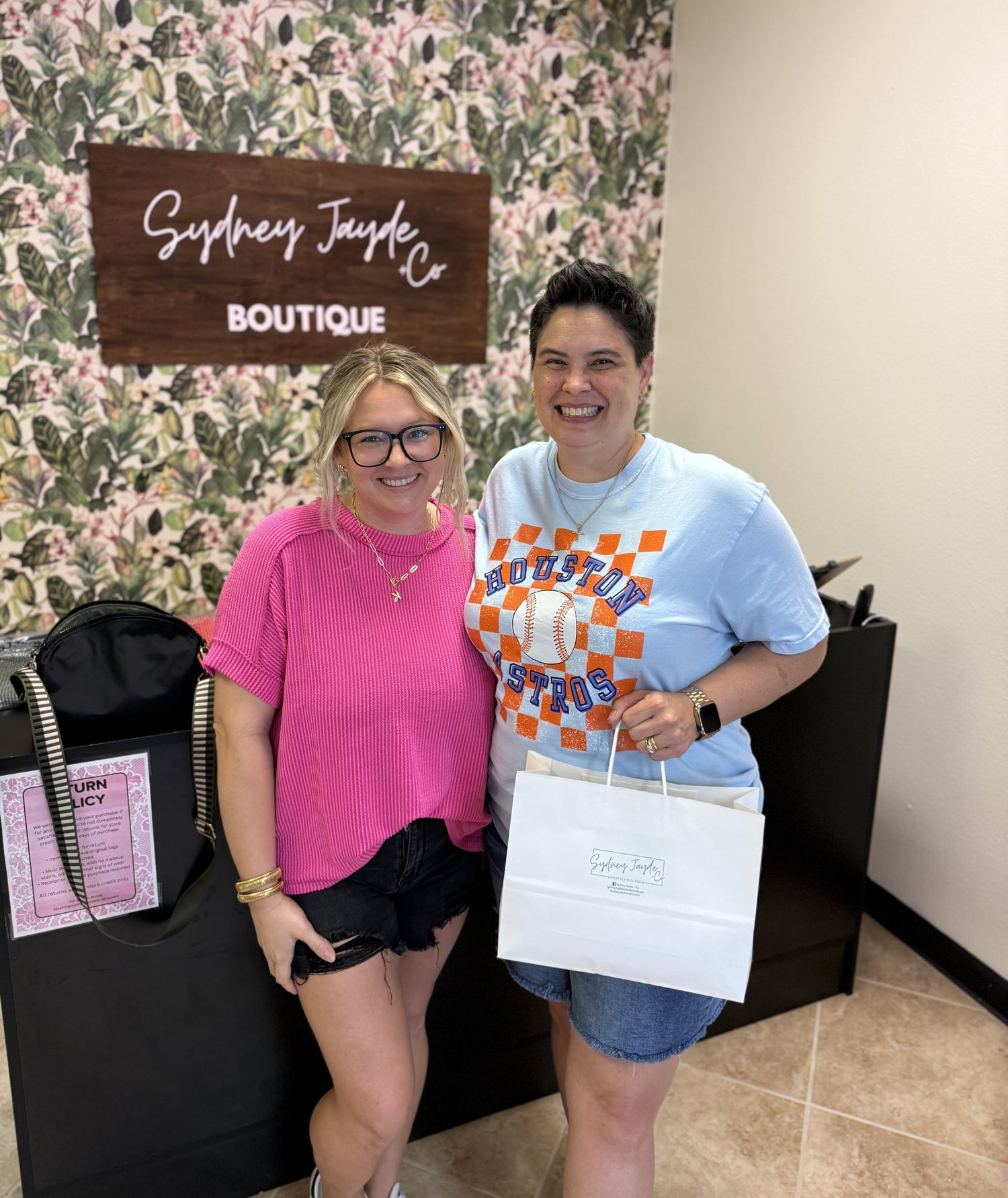 Lisa, a customer from Spring Trails, shopping at Sydney Jayde & Co Boutique in Spring, TX.