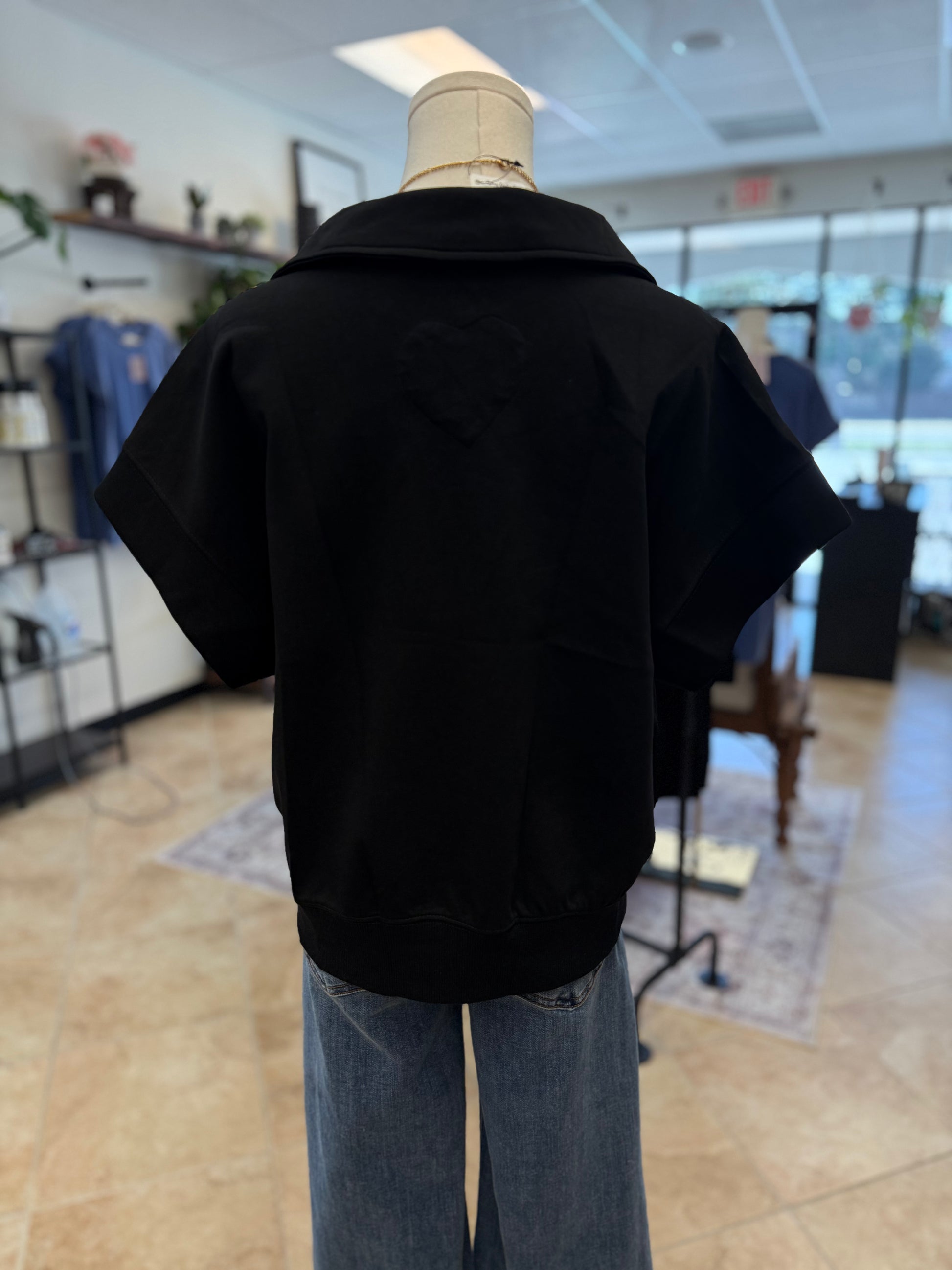 Black blouse with color and wide band on arm and bottom